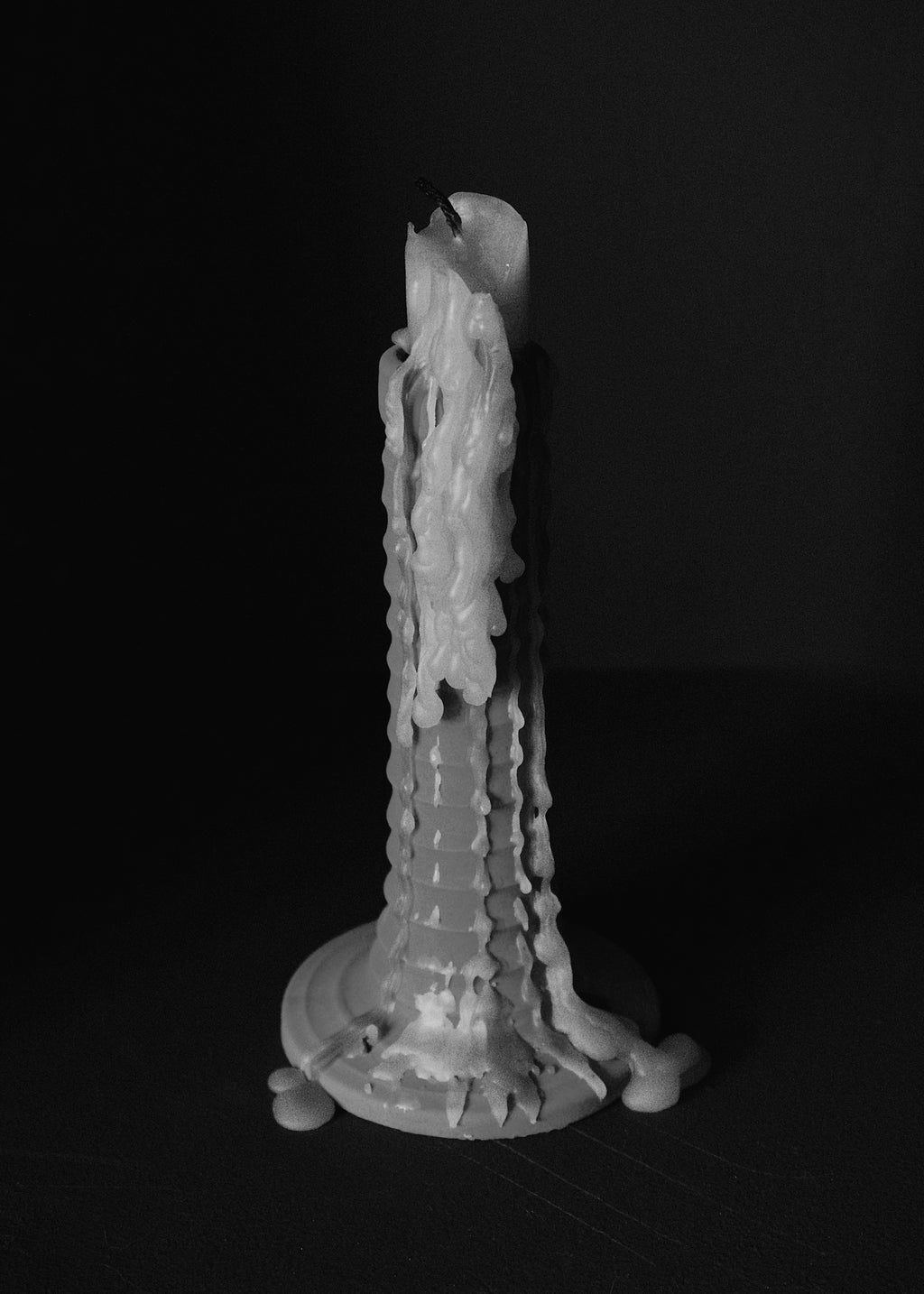 Detail shot of Naeos stoneware column candlestick showing handmade surface quality