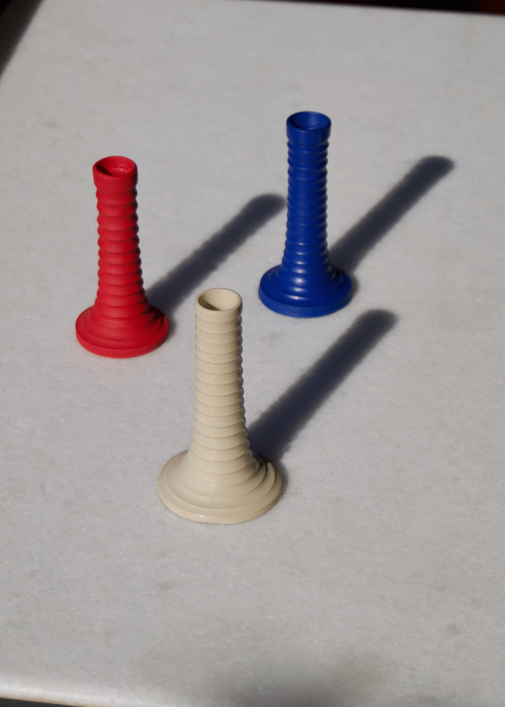 Naeos stoneware column candlestick — close-up showing glaze texture and finish